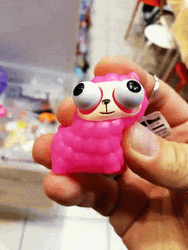 Eyes Popping Out Pink Toy GIF