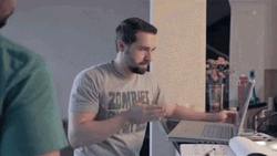 Face Slap Across Laptop Screens GIF