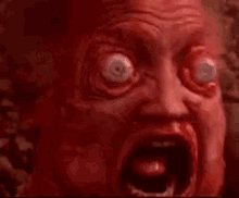 Face With Scary Eyeball GIF | GIFDB.com