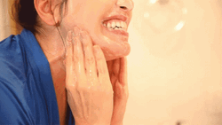 Facial Scrubbing Face Around Smiling Sharzad Kiadeh GIF