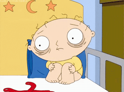 Family Guy Character Sitting On Bed With Crossed Feet GIF