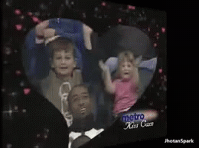 Family In Heart Frame Metro Kiss Cam GIF
