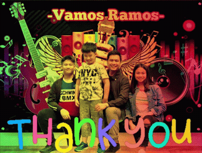 Family Posing In Front Of Vamos Ramos Poster GIF