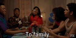 Family Raising Glasses Up GIF