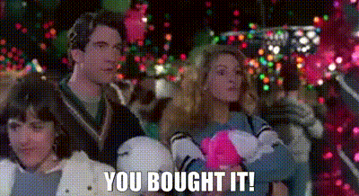 Family Sitting By Christmas Tree Saying You Bought It GIF