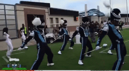 Famu Marching 100 Band Members Holding Staff GIF