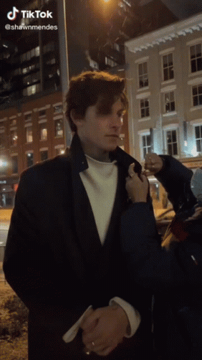 Fan Signing Man In Suit GIF