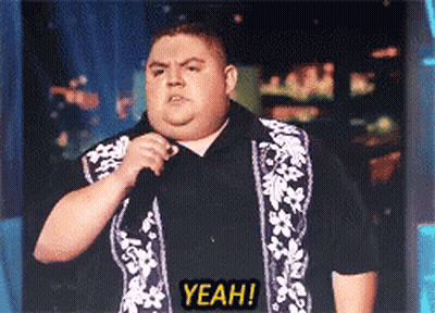 Fat Man Holding Microphone Saying Yeah GIF