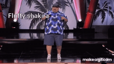 Fat Man In Blue Shirt On Stage With Fluffy Shakira GIF