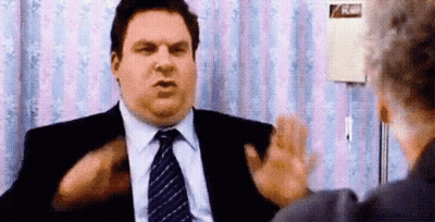 Fat Man In Suit And Tie Talking To Doctor GIF