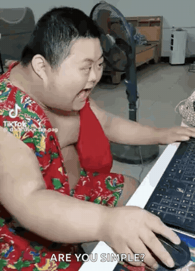 Fat Man Sitting At Computer Using Mouse GIF