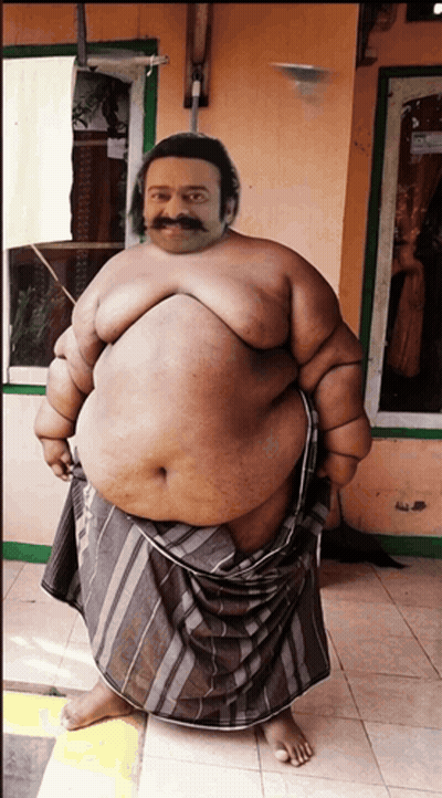 Fat Man With Mustache Standing In Front Of House GIF