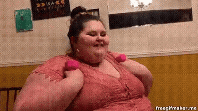 Fat Woman In Pink Dress Holding Pink Dumbbell GIF