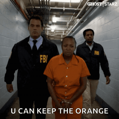 FBI Agent Leading Prisoner Down Hallway GIF