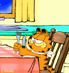 Feed Me Garfield On Chair GIF