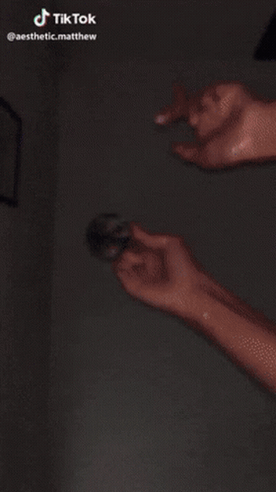 Feet Covered In Glitter With TikTok Watermark GIF