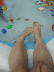 Feet In An Inflatable Pool GIF