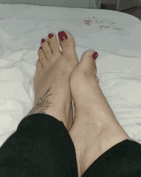 Feet Wiggling With Red Nails GIF