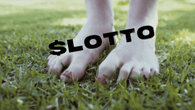 Feet With Lotto On Grass GIF