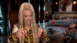 Feisty Erika Jayne Cat Swiping Motion  GIF