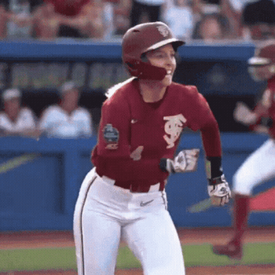 Female Baseball Player In Maroon Jersey And White Pants GIF
