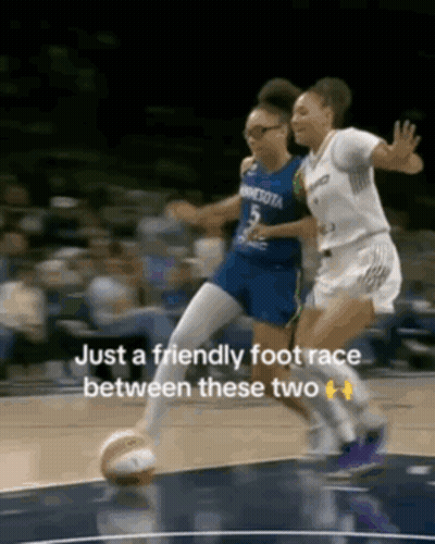 Female Basketball Player Celebrating In Minnesota Jersey GIF