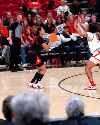 Female Basketball Player Holds Sign I Am A Keeper GIF