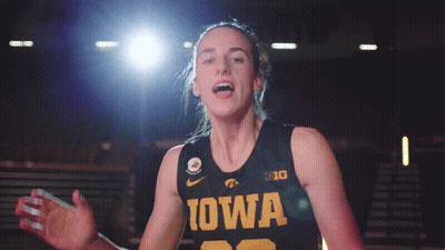 Female Basketball Player In Black And Yellow Iowa Jersey GIF