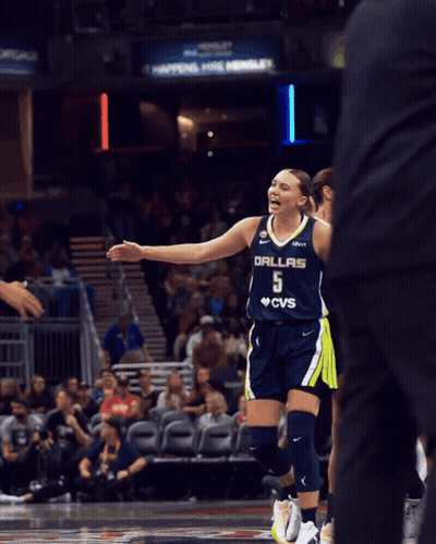 Female Basketball Player In Dallas 5 Jersey Shaking Hands GIF
