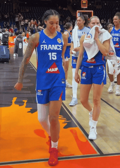 Female Basketball Player In France 15 Jersey Walking Off Court GIF