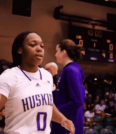 Female Basketball Player In Huskies Jersey Walking GIF