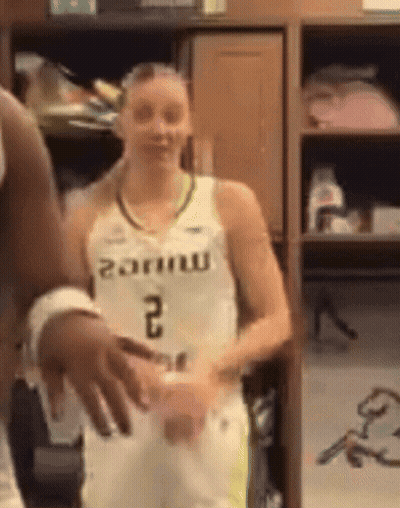 Female Basketball Player In Number 2 Jersey In Locker Room GIF