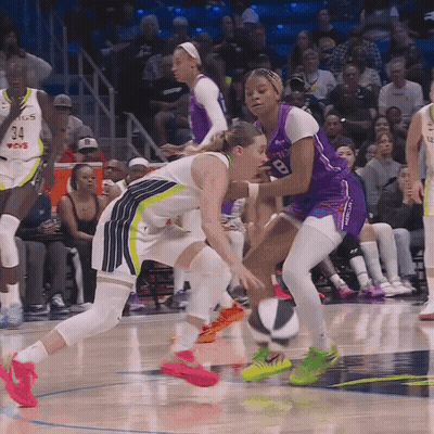 Female Basketball Player In Purple Number 8 Jersey GIF