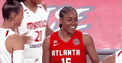 Female Basketball Player In Red Atlanta 15 Jersey GIF