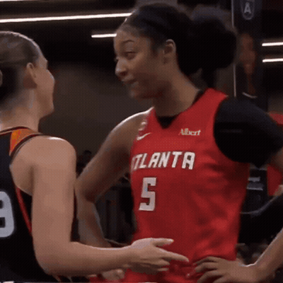 Female Basketball Player In Red Atlanta Jersey GIF