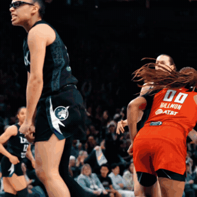Female Basketball Player In Red Jersey Number 00 GIF