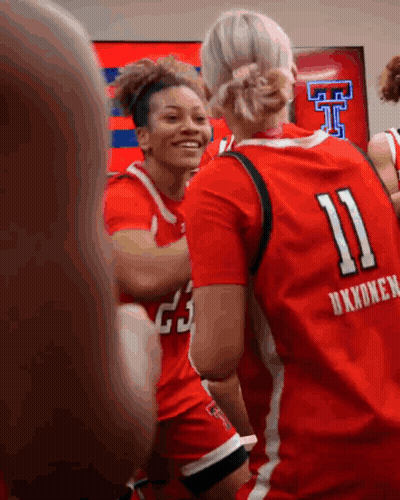 Female Basketball Player In Red Jersey Number 11 GIF
