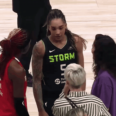 Female Basketball Player In Storm 5 Jersey Talking To Fan GIF