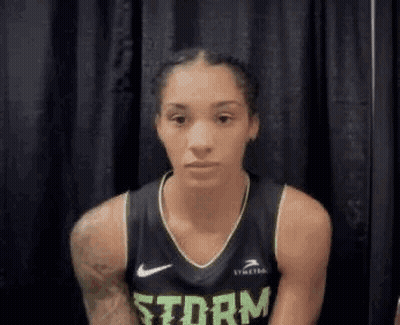 Female Basketball Player In Storm Jersey GIF