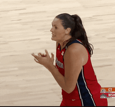 Female Basketball Player in Washington Jersey