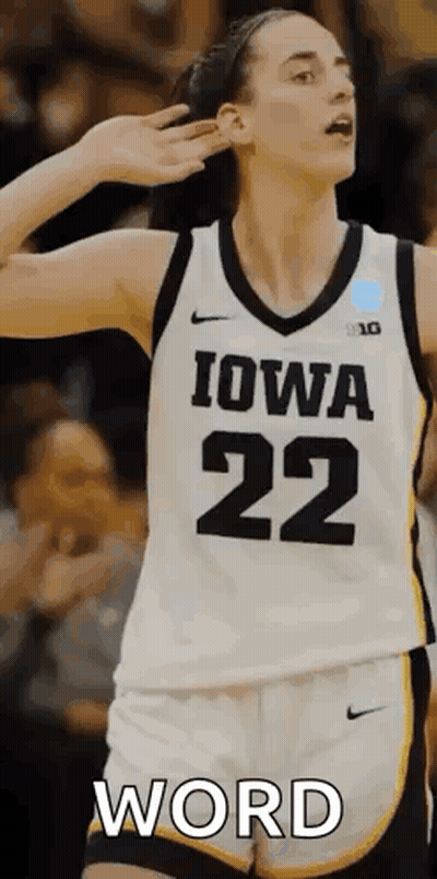 Female Basketball Player In White And Black Jersey Number 22 Making Funny Face GIF