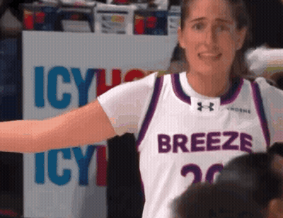 Female Basketball Player In White And Purple Jersey GIF