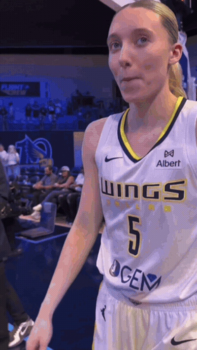 Female Basketball Player In Wings Jersey GIF