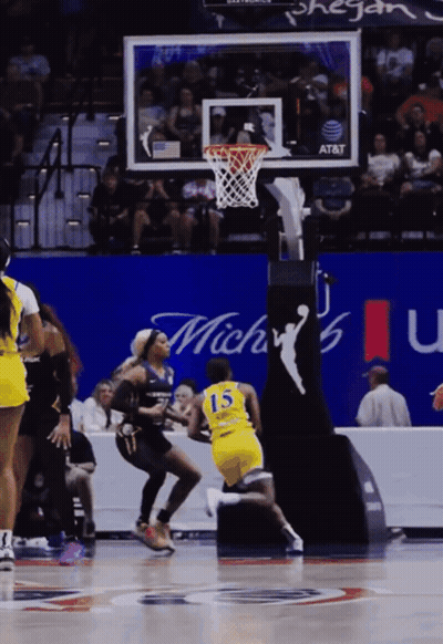 Female Basketball Player In Yellow Jersey Number 15 GIF