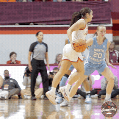 Female Basketball Player Number 20 Dribbling GIF