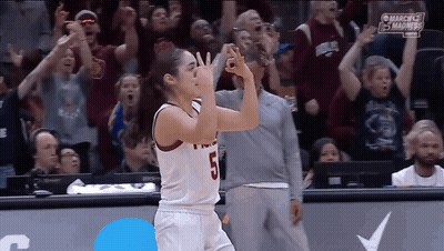 Female Basketball Player Number 5 In Front Of Crowd GIF