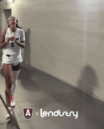 Female Basketball Player Number 5 In Locker Room GIF