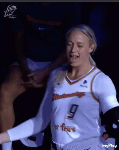 Female Basketball Player Number 9 Sticking Tongue Out GIF