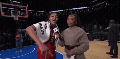 Female Basketball Player Wearing Trade Towel GIF