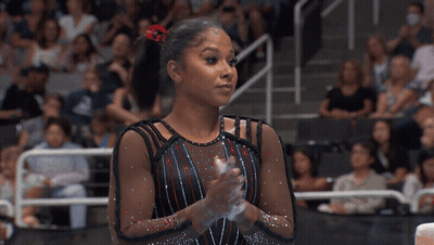 Female Gymnast Clapping Before Crowd GIF